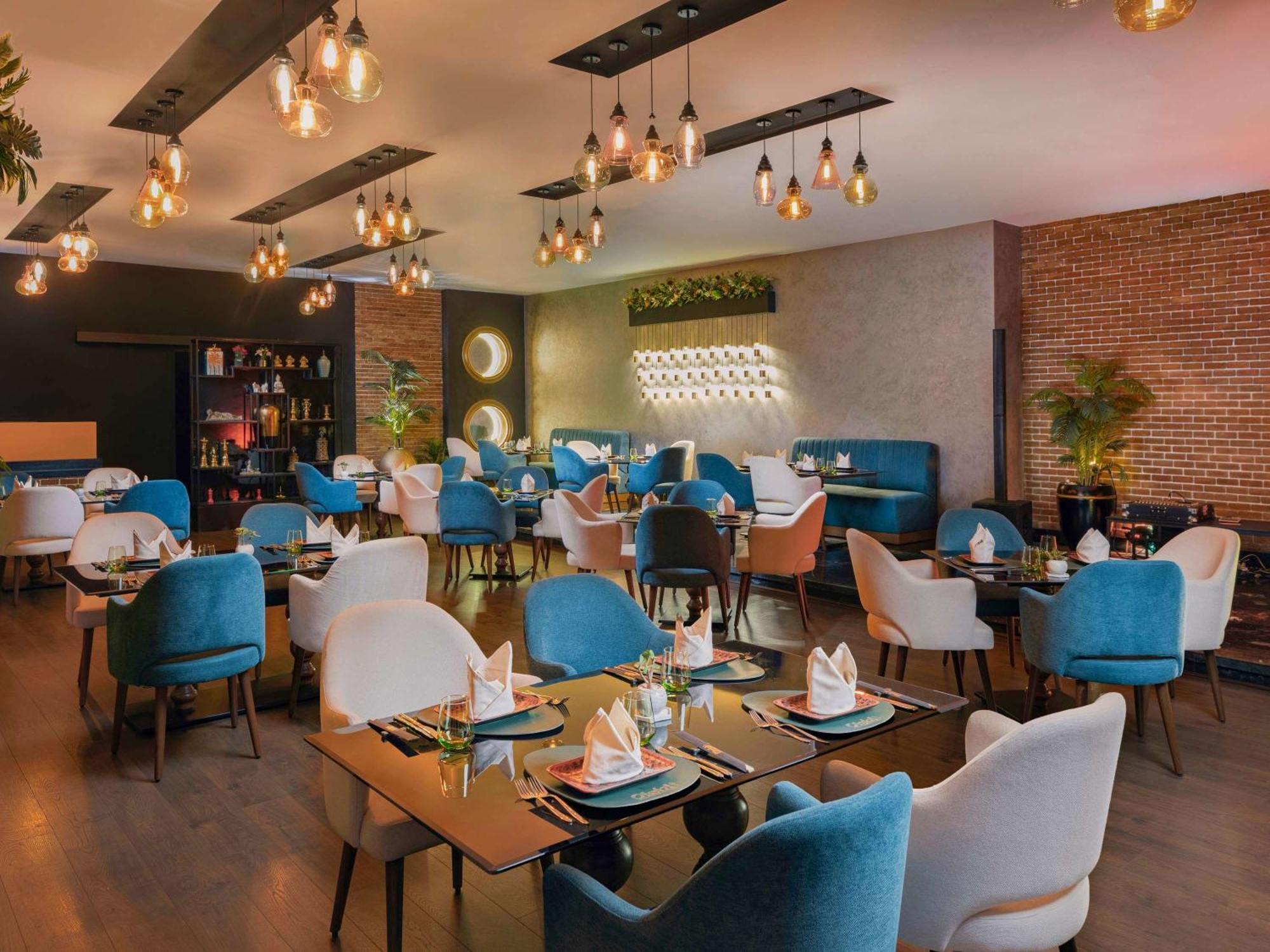 Moevenpick Hotel Cairo - Media City Giza Zewnętrze zdjęcie The restaurant